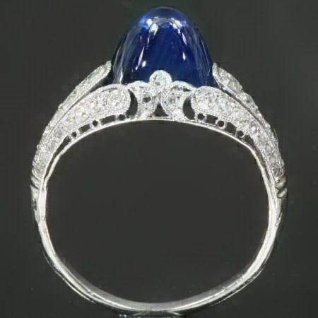Most elegant Art Deco engagement ring with diamonds and pain du sucre sapphire