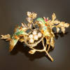 Antique brooches between $500 and $1500
