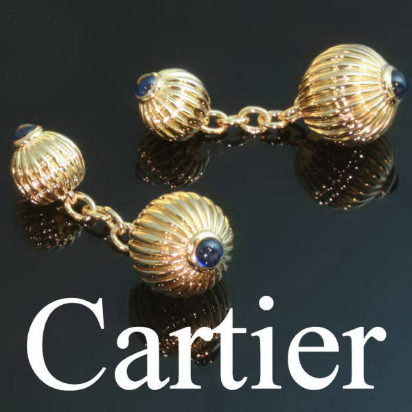 Estate cufflinks by Cartier, gold set with cabochon sapphires