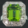 Magnificent platinum Art Deco engagement ring with big peridot and brilliants