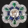 Platinum Art Deco inspired diamond sapphires and emeralds estate engagement ring