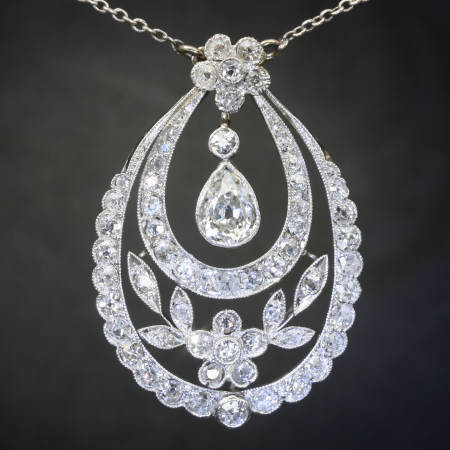 Art Deco Edwardian pear diamond solitaire pendant, flowery design from the antique jewelry collection of www.adin.be