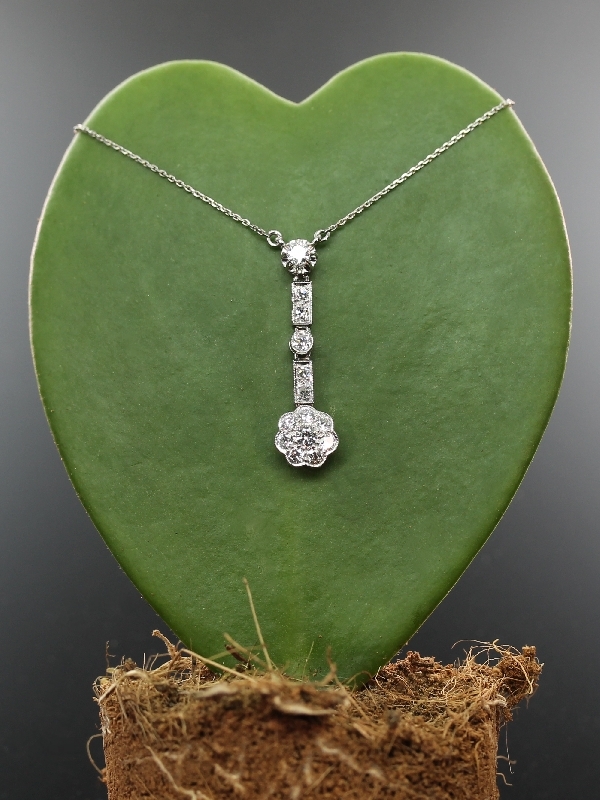 Art Deco platinum diamond set pendant on platinum chain from the antique jewelry collection of www.adin.be