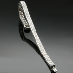 Platinum estate Art Deco diamond tennis bracelet from the fifties from the antique jewelry collection of www.adin.be