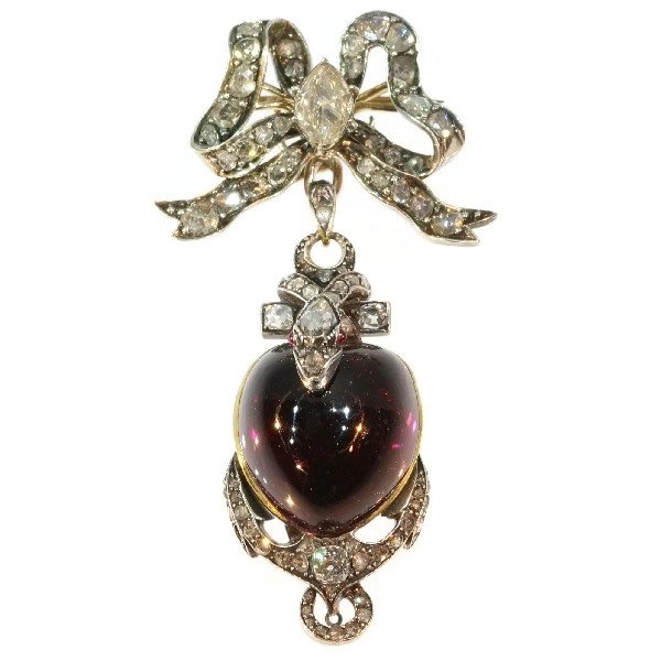 Click the picture to get to see this Early-Victorian diamond brooch-pendant with heart, snake and anchor under a bow also medallion..
