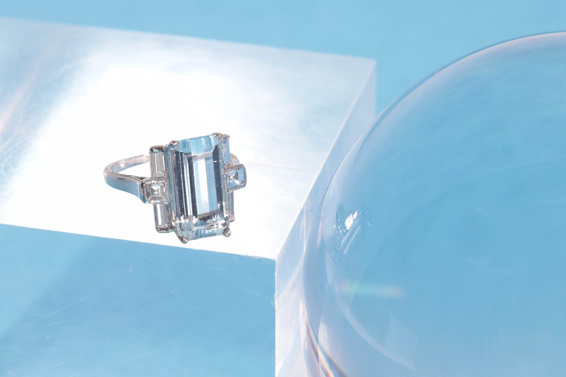 Click the picture to get to see this Vintage Fifties design white gold ring with aquamarine and diamonds.