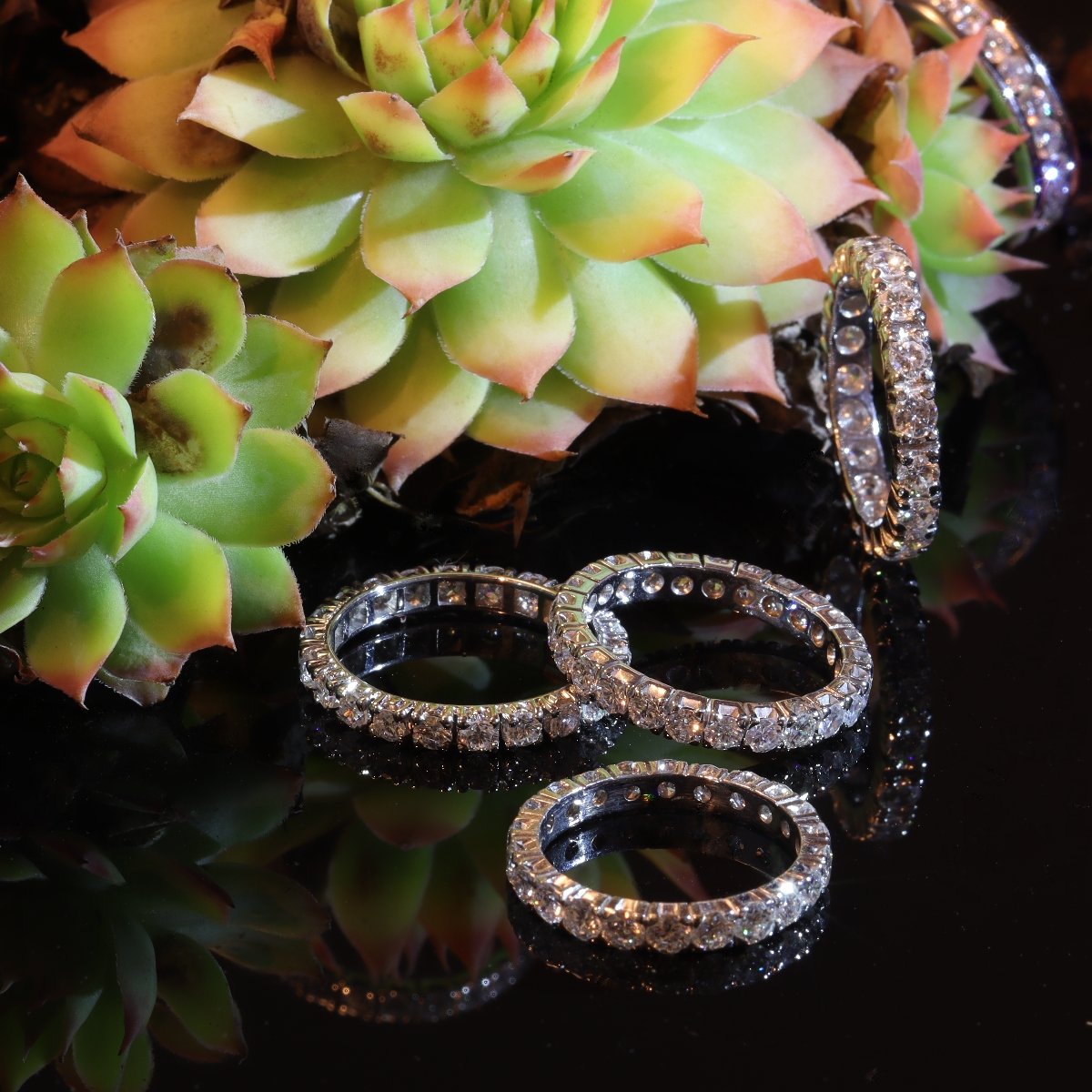 Click the picture to get to see our collection of vintage eternity bands.