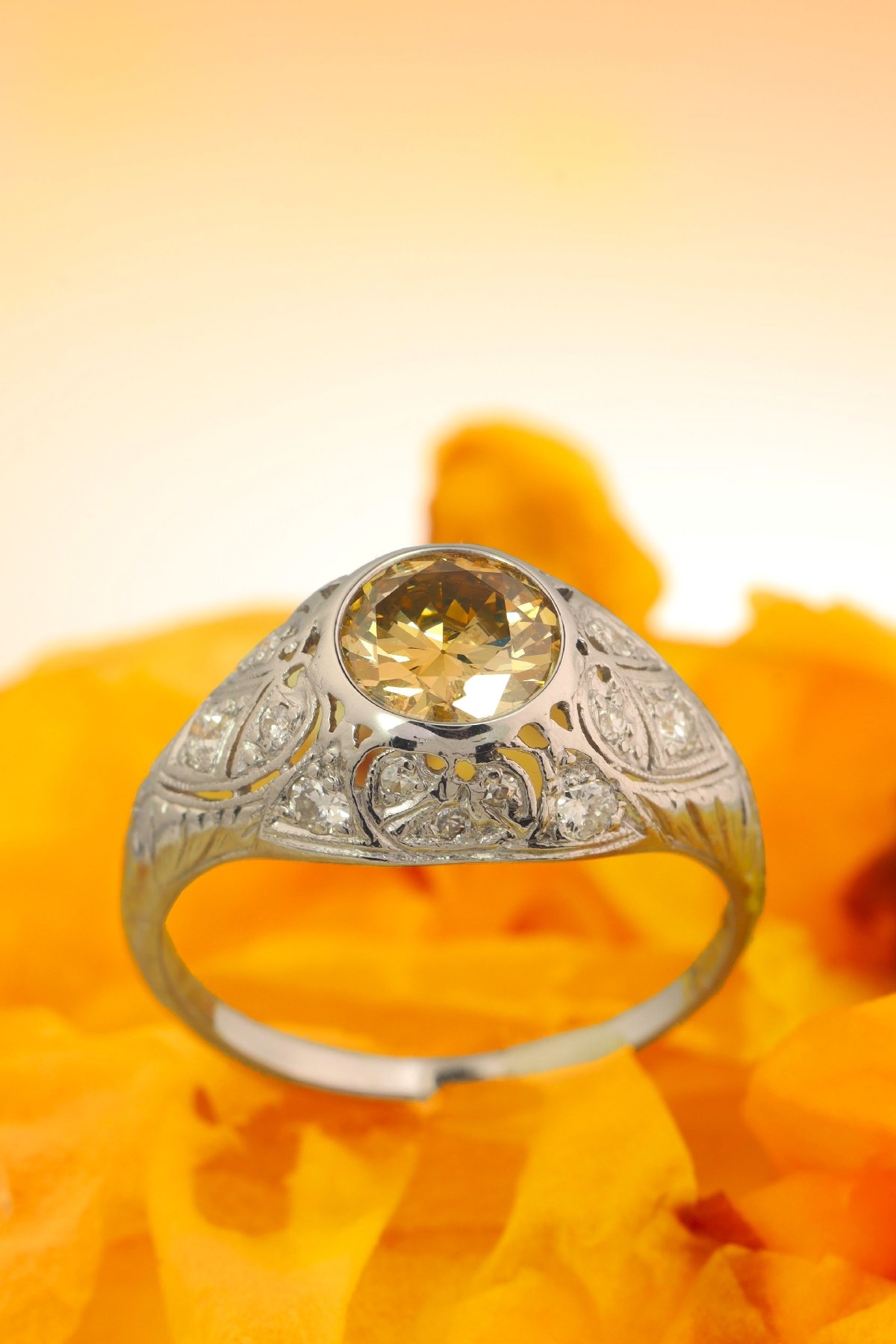 Click the picture to get to see this Vintage Fifties Art Deco engagement ring with natural fancy colour brilliant