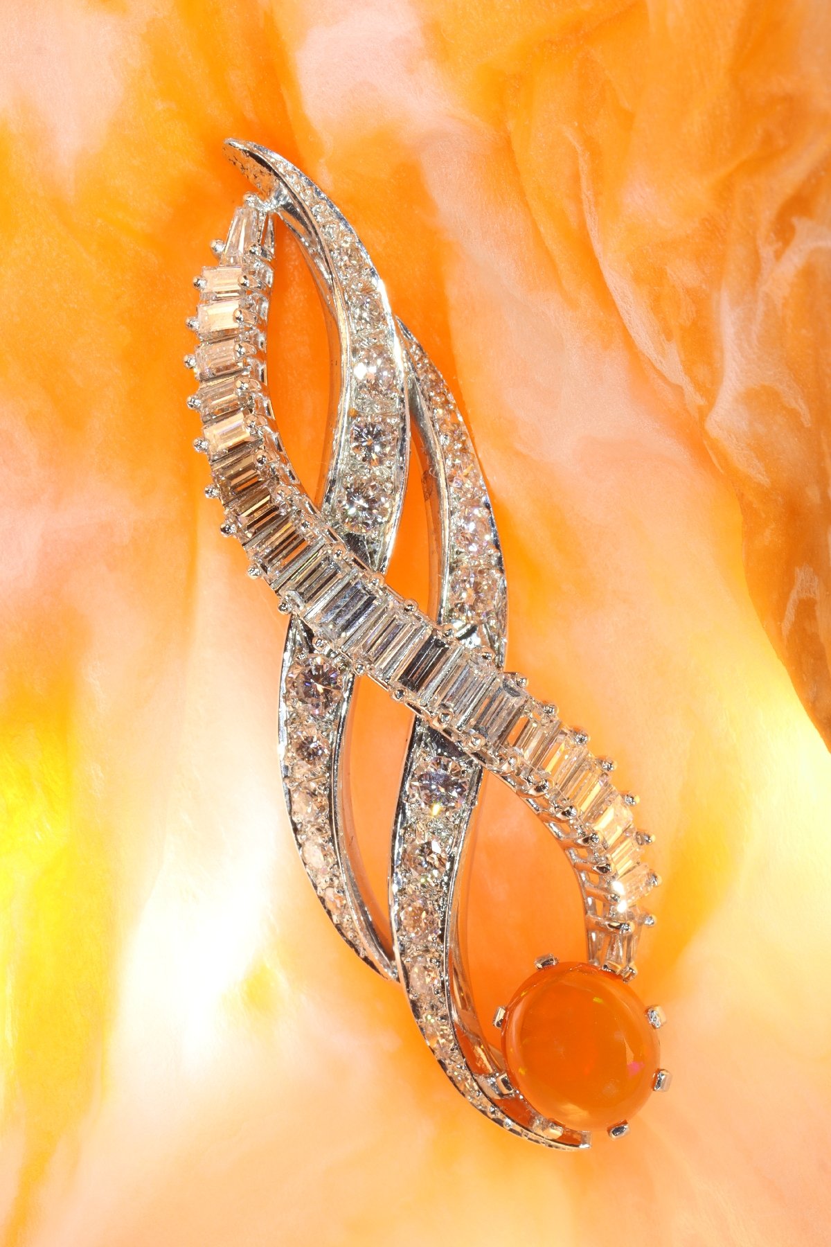 Click the picture to get to see this Vintage 1960's burning flame pendant with fire opal and diamonds.