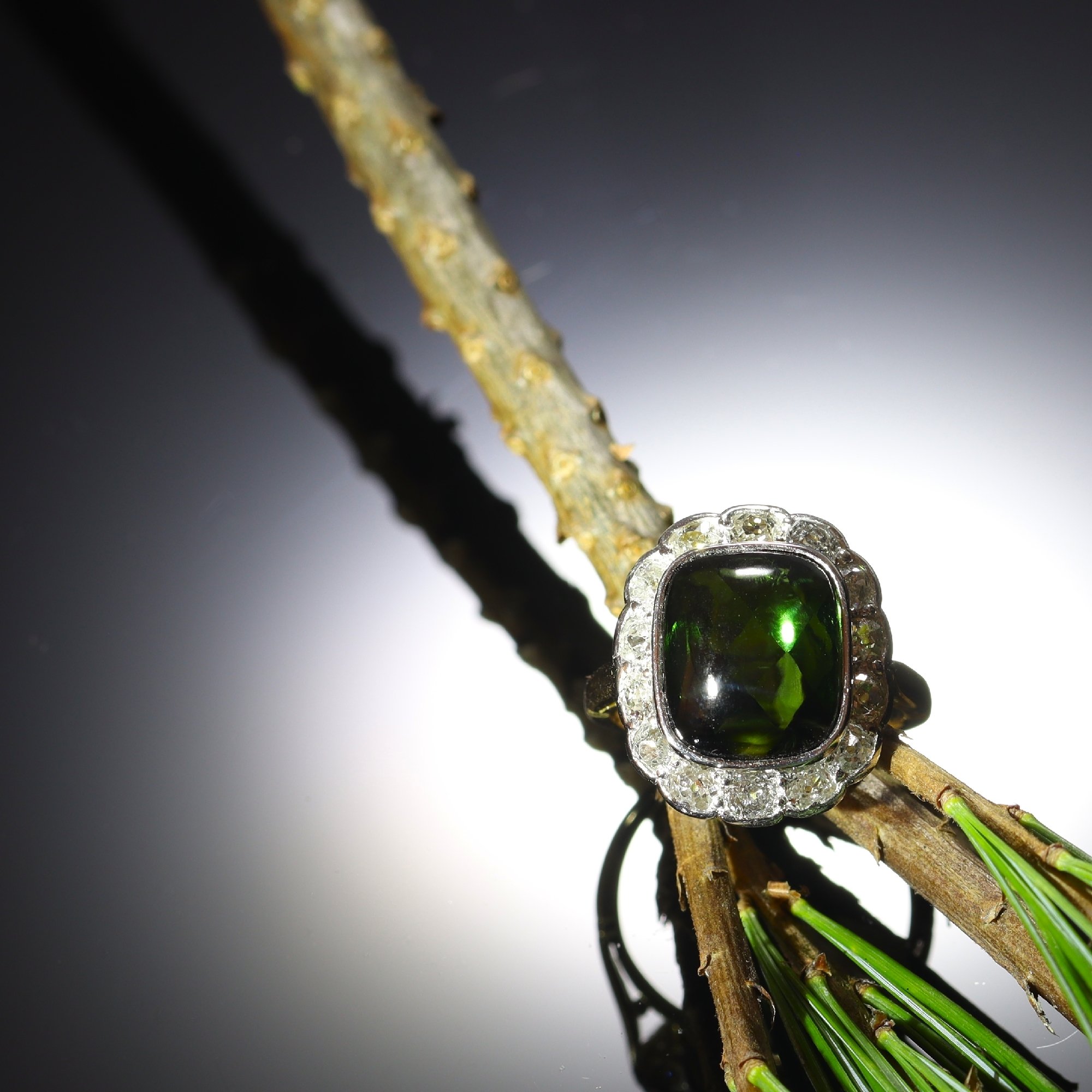 Click the picture to see more of this vintage diamond ring with large verdelite (green tourmaline)