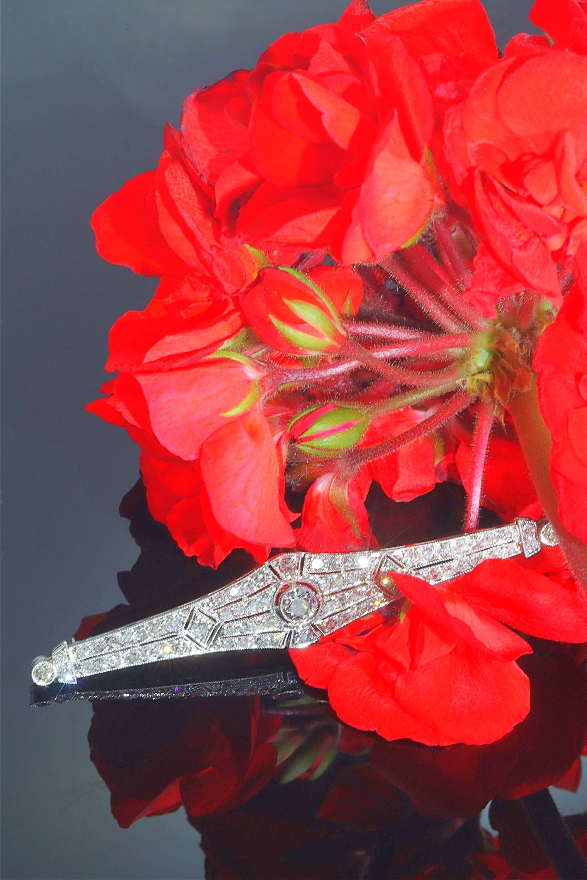 Click the picture to see of this Vintage platinum Art Deco diamond bar brooch with 71 diamonds