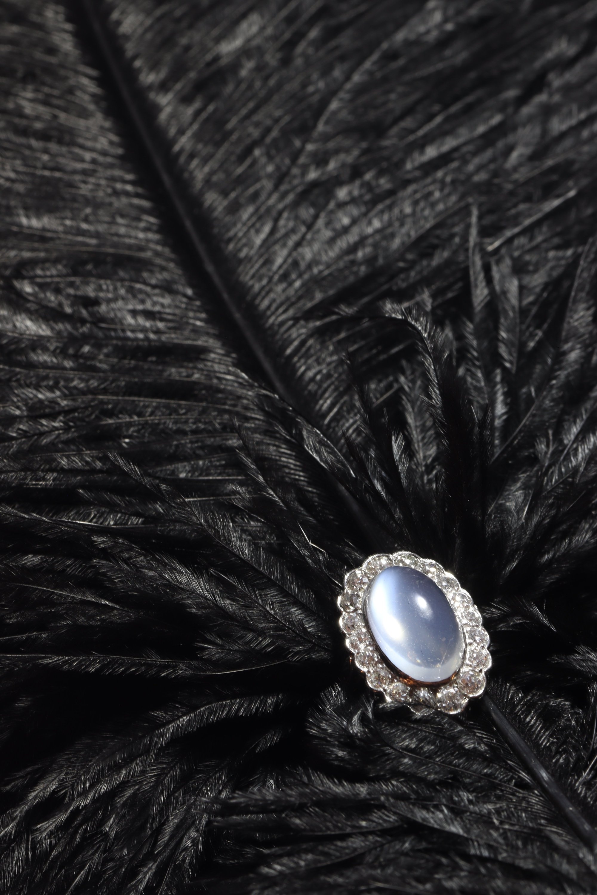 Click the picture to see of this Vintage platinum diamond ring with magnificent moonstone