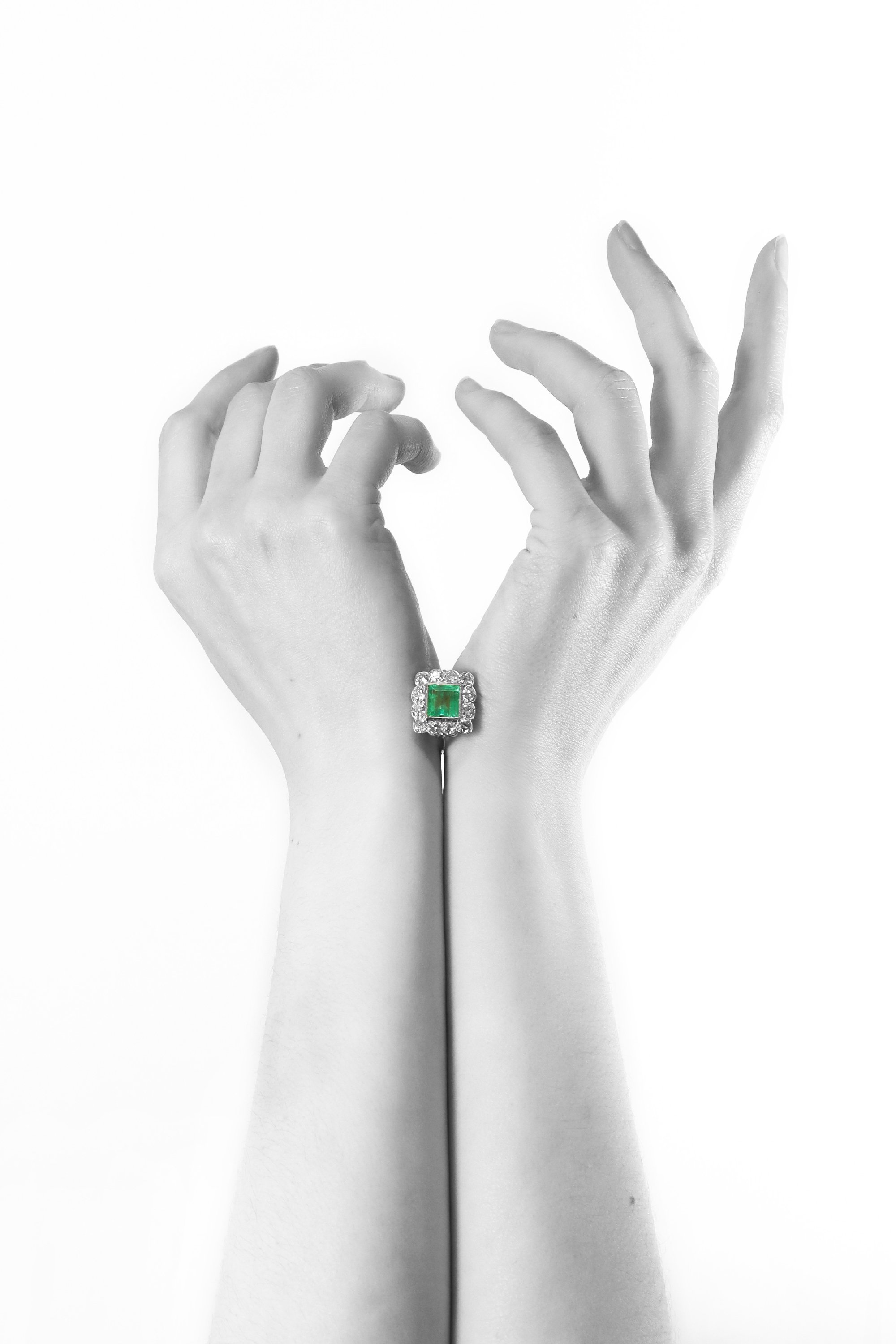Click the picture to find out more about this Geometric Grace: A Vintage Art Deco Emerald and Diamond Ring