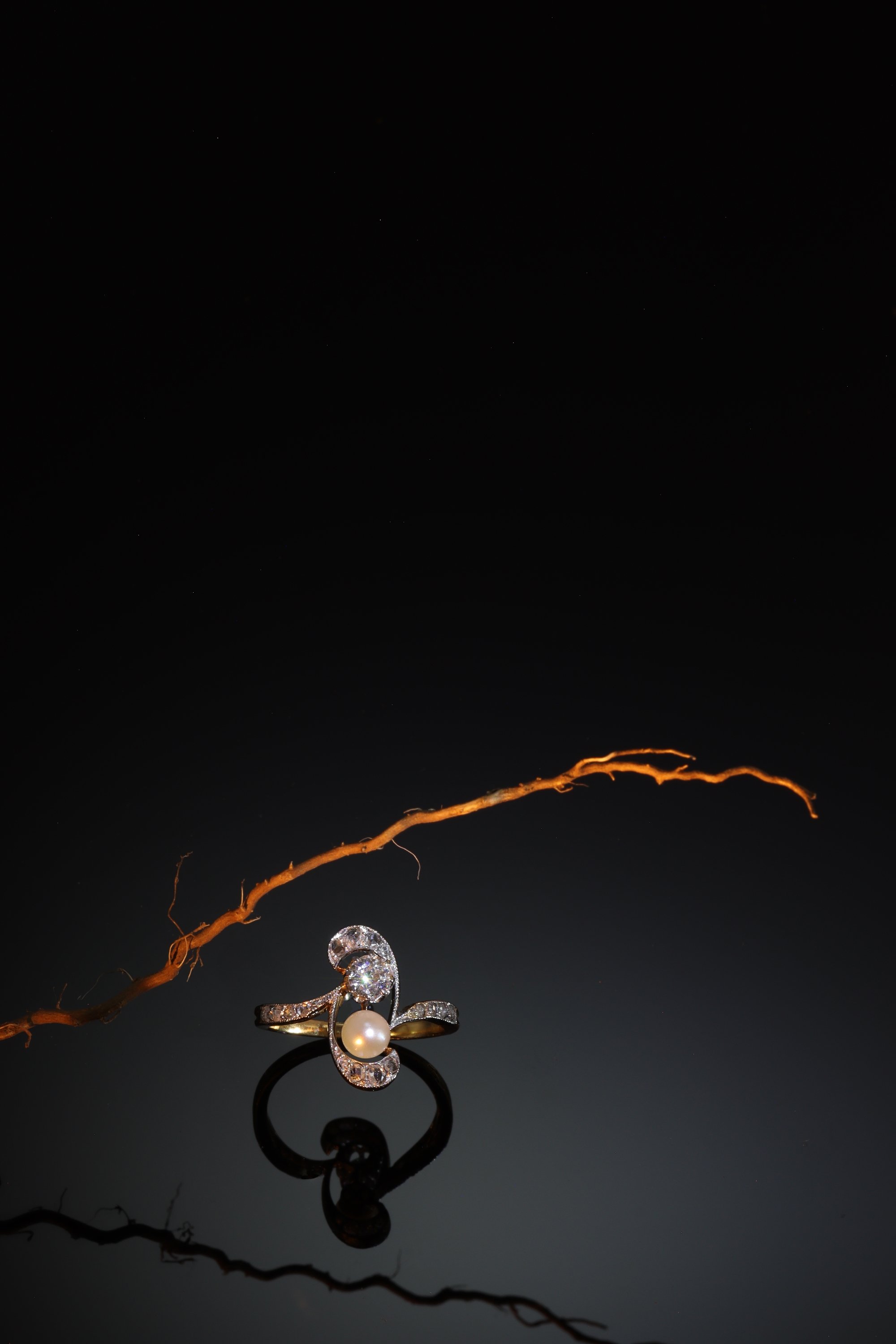 Click the picture to find out more about this original Art Nouveau diamond and pearl engagement ring