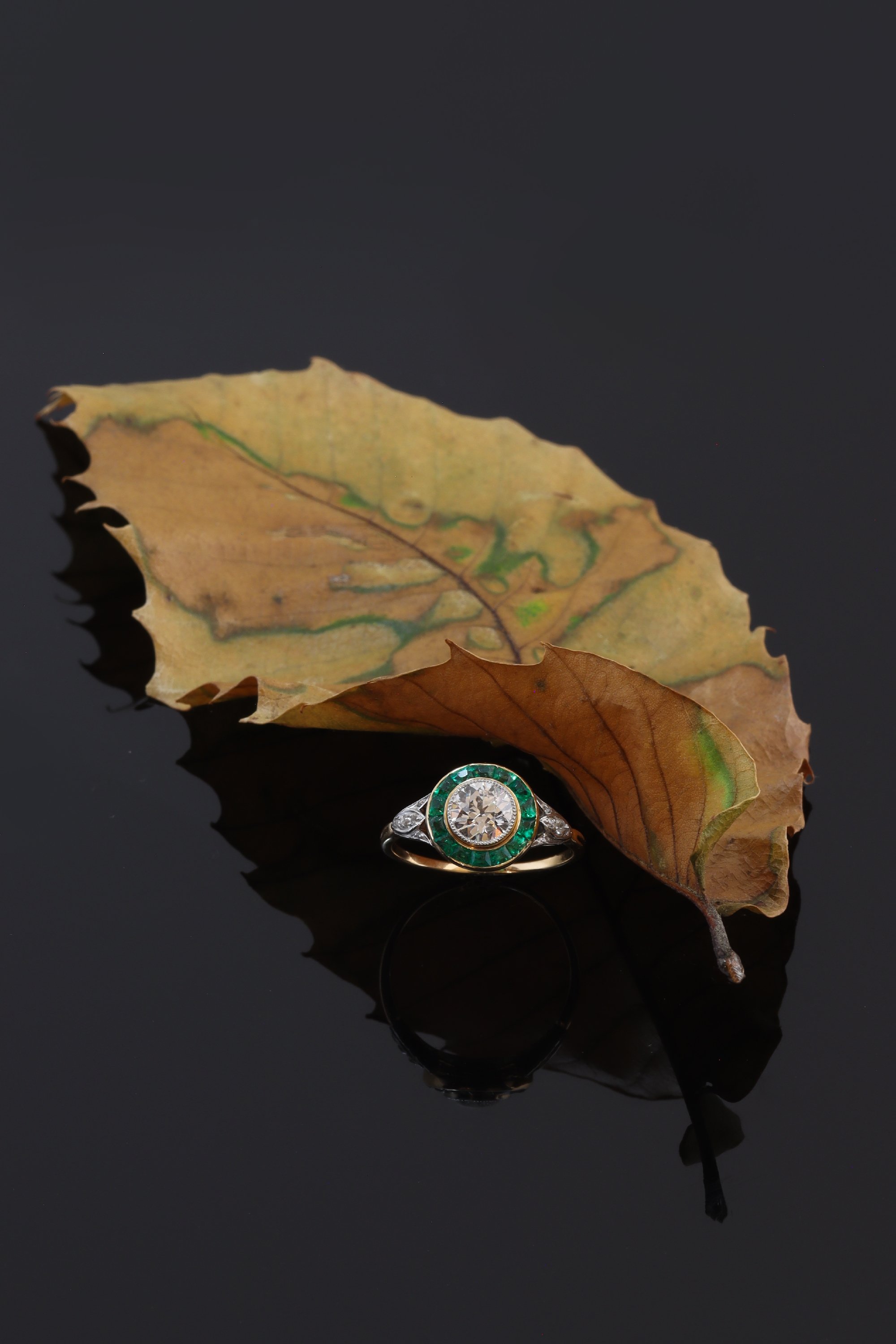 Click the picture to find out more about this Vintage 1920s Art Deco Diamond and Emerald Engagement Ring