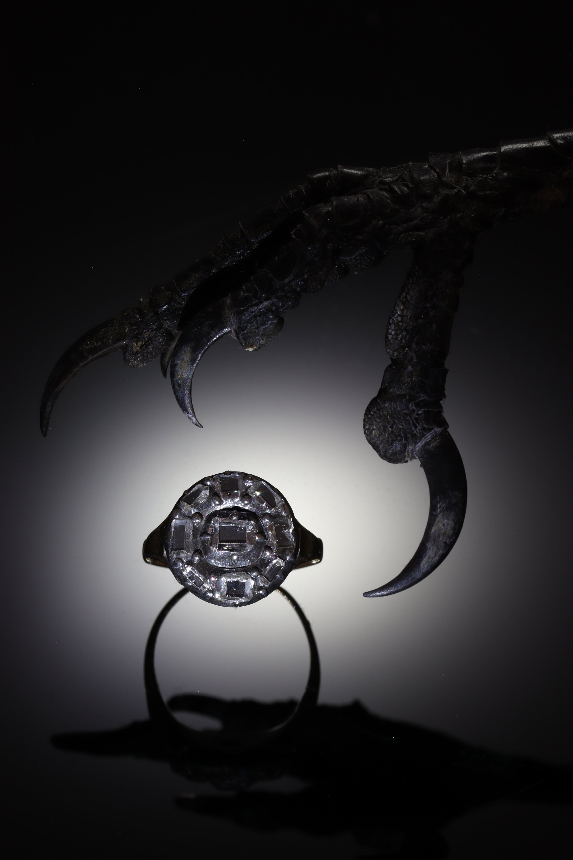 Click the picture to find out more about this Table Cut Brilliance: A Rare Diamond Cluster Ring from circa 1600