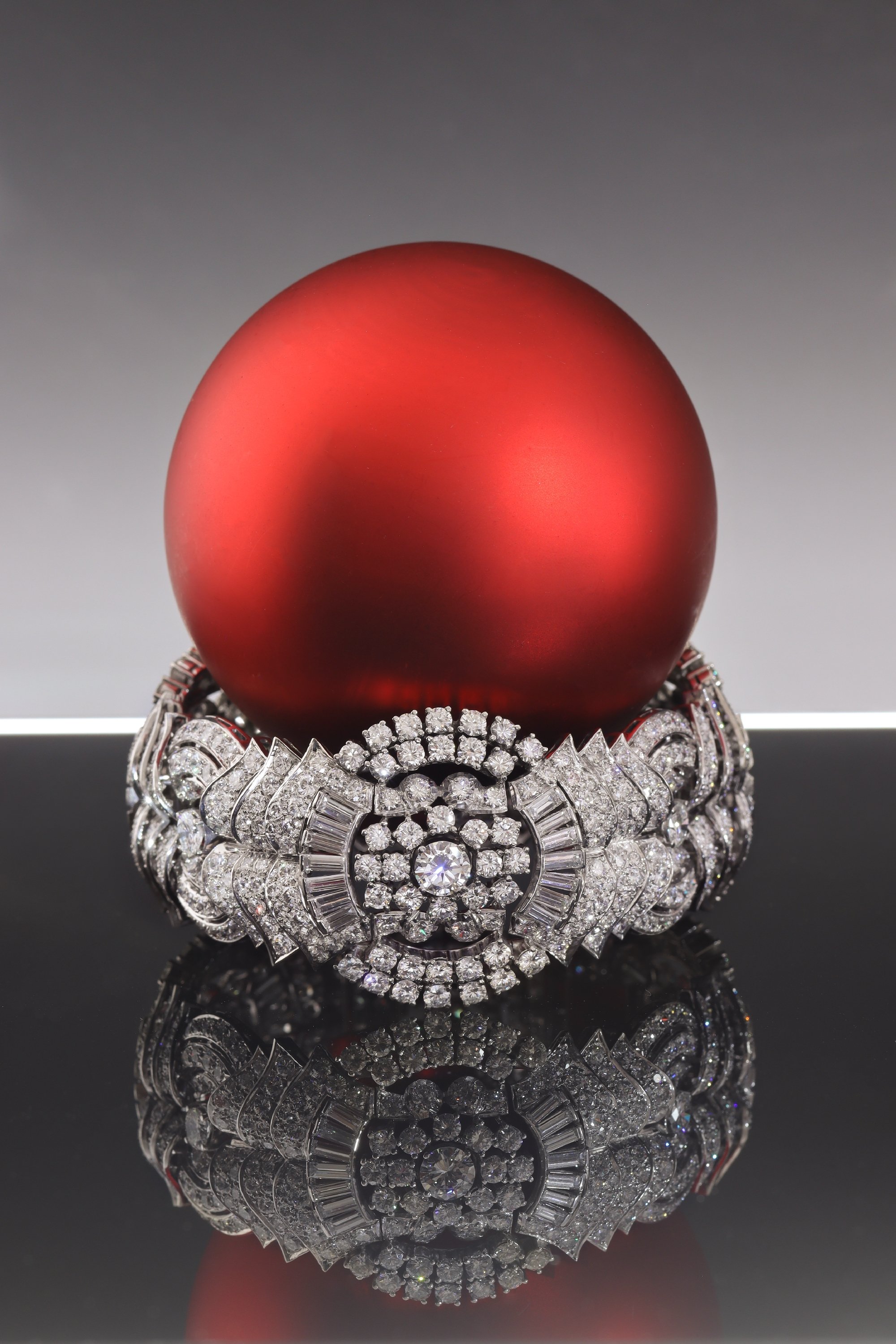 Click the picture to find out more about this Architectural Fifties Bracelet Ablaze with Diamonds in a Bold Sculptural Design