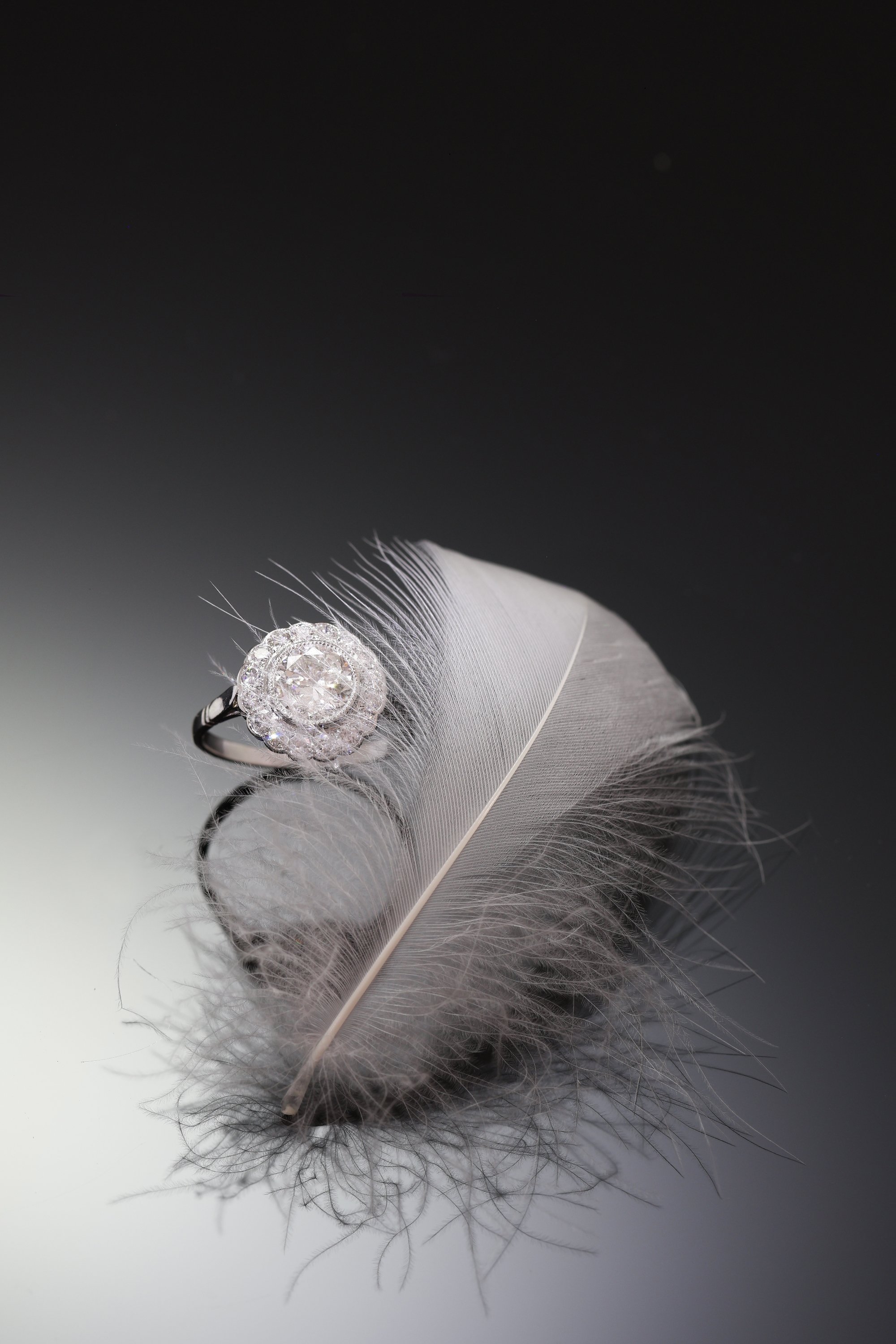 Click the picture to find out more about this 1950s Art Deco Revival Platinum Ring, a Classic Symbol of Love and Continuity