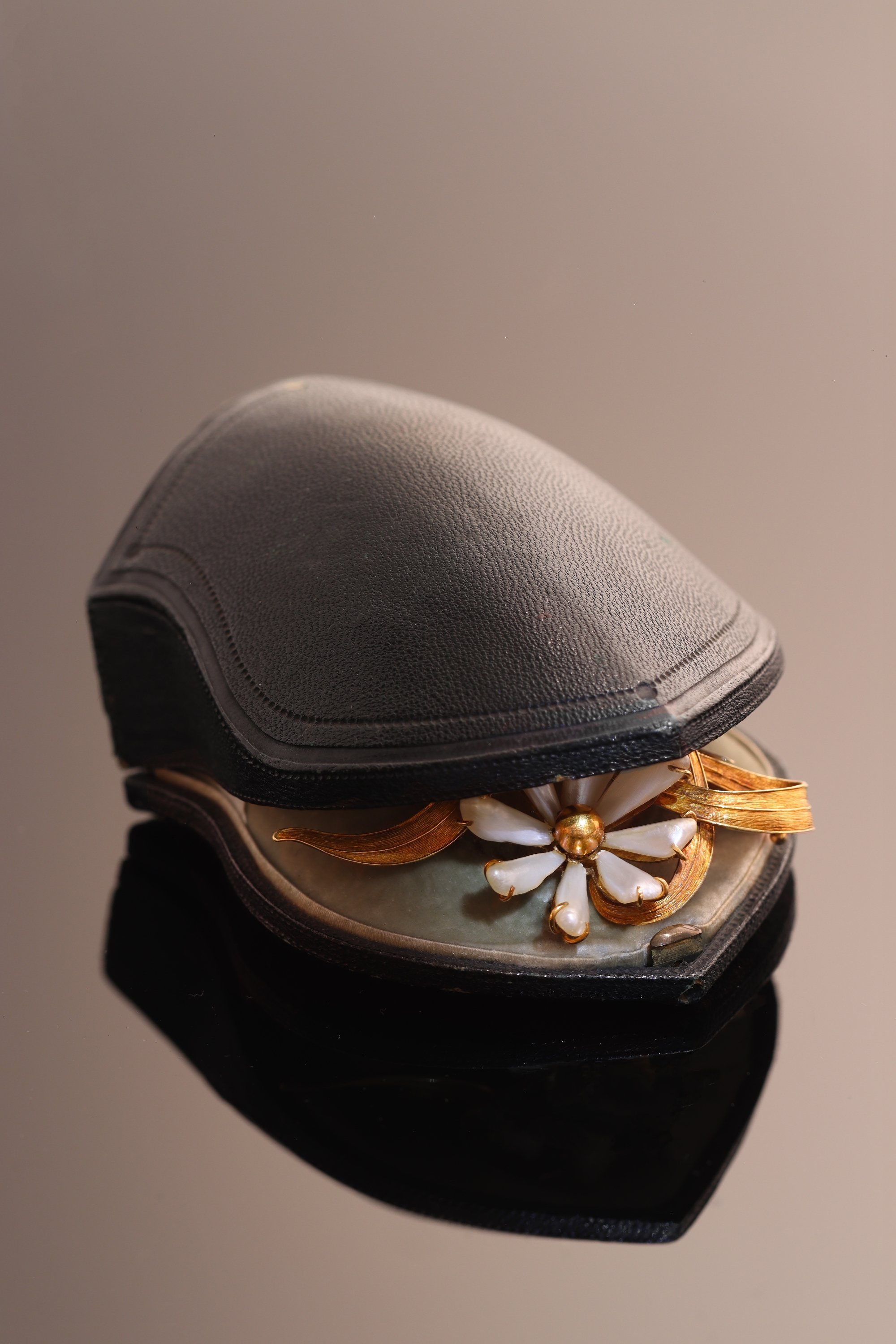 Click the picture to find out more about this Art Nouveau Flower Brooch with Dogtooth Pearls, circa 1900 in 18ct Gold