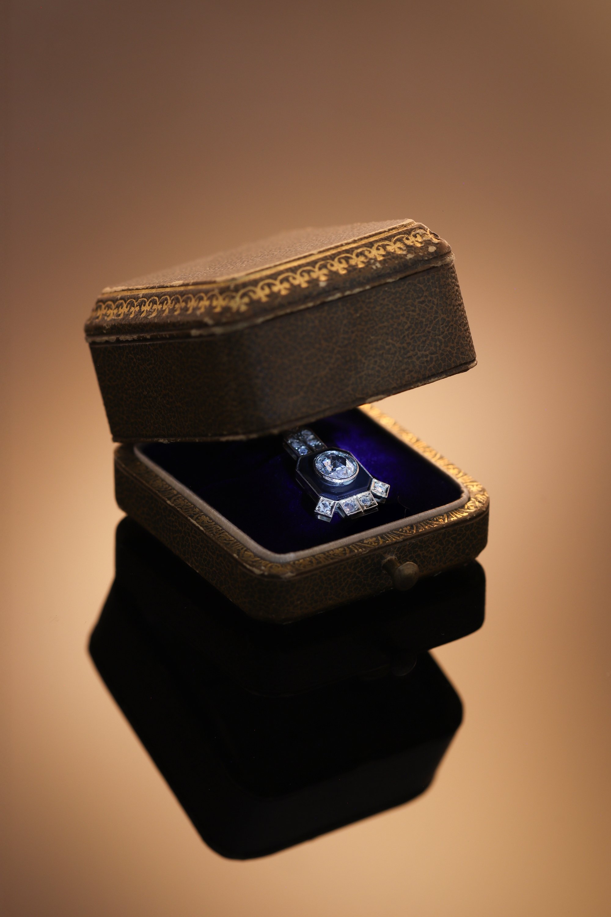 Click the picture to find out more about this Circa 1930 Art Deco pendant, onyx plaque with a prominent rose cut diamond