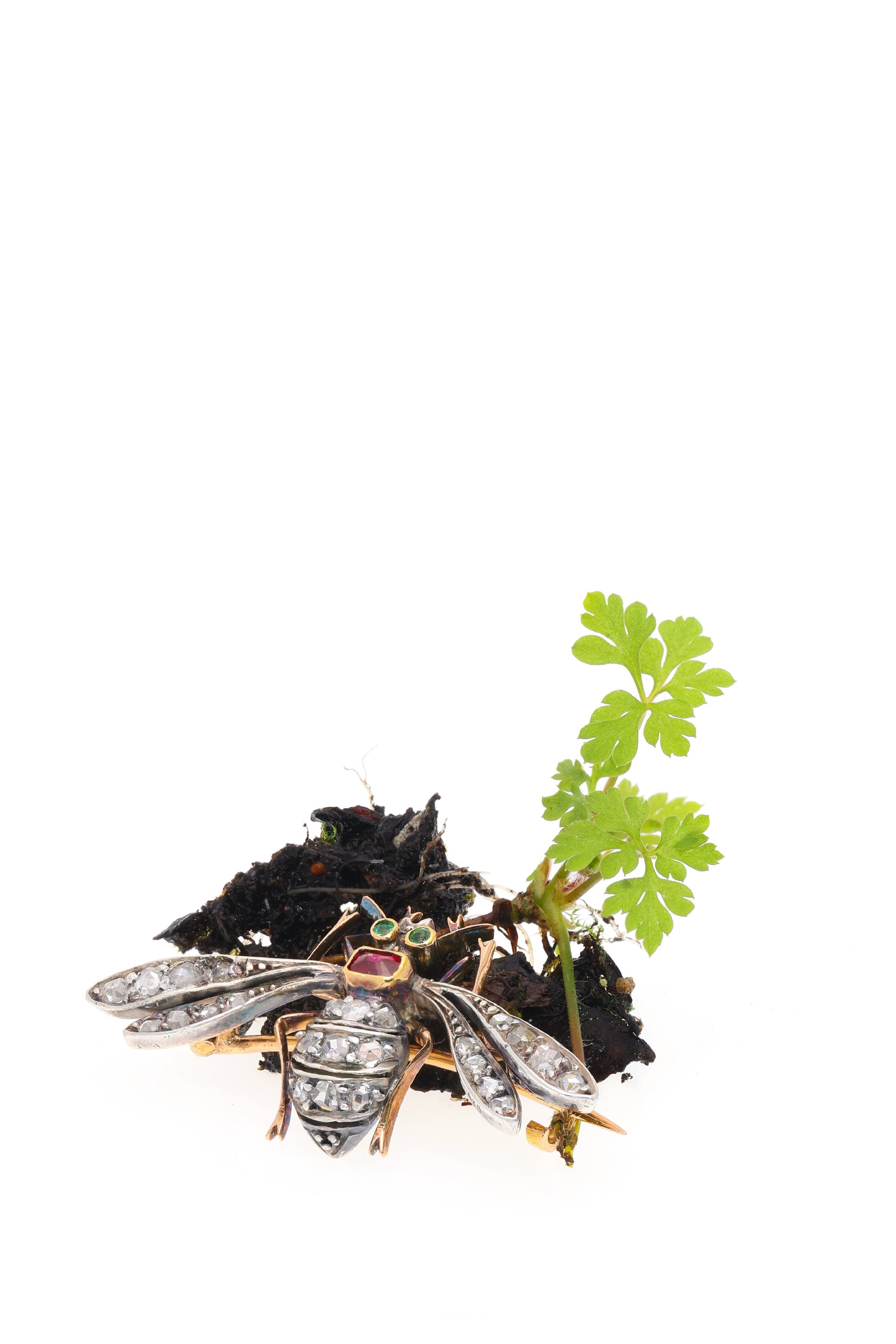 Click the picture to find out more about this Late Victorian Diamond Bee Brooch, Ruby Thorax and Emerald Eyes